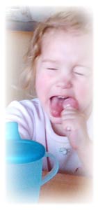 child eating lollypop